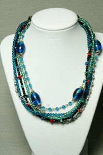   Necklace. Many funky multicolor beaded strands. Very Cheery Necklace
