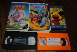   VHS childrens movies DUMBO, JUNGLE BOOK, BEST OF ELMO, BLUES CLUES