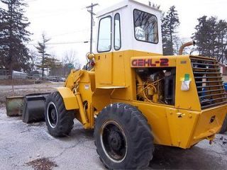   1500 LOADER diesel 4x4 drive with 12 snow plow, CAB,HEATER,CAT,CASE