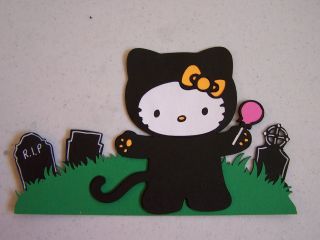 Cricut Hello Kitty in Black Cat Costume in the Graveyard 