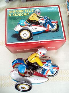   Tin Toys motorcycle and side car wind up in Original Box MIB