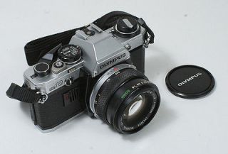 Olympus OM 10 35mm SLR Film Camera with 50mm Lens Kit