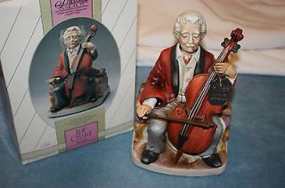 VINTAGE   MELODY IN MOTION   1986 THE CELLIST   PORCELAIN BISQUE 
