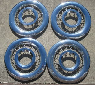 Set of 1949 1954 Ford wire wheel covers nice used