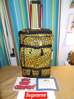 The North Face for Supreme Rolling Thunder Bag taxi yellow cheetah 