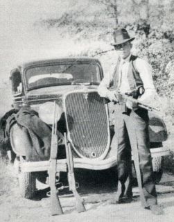 Clyde Barrow Photo with Rifles stolen in robbery COOL