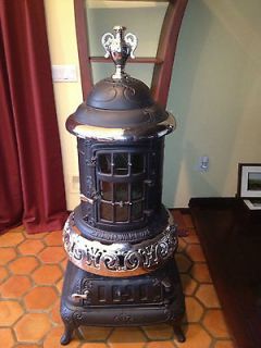 Antique Stewart 270 Oak wood or coal burning pot belly stove / base 