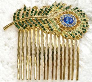 FEATHER HAIR COMB in Clothing, 