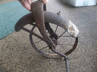 Vintage rustic tricycle wheel and fender