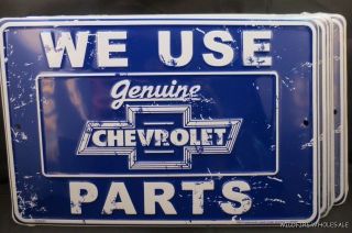 WHOLESALE LOT OF 12 CHEVROLET SIGNS METAL TIN We Use Chevy Parts GM 
