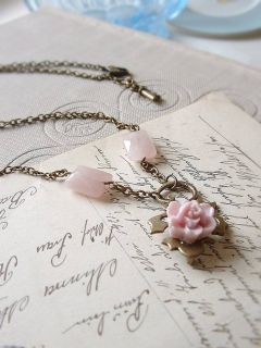 Handmade necklace, made with delicately carved resin flower and 