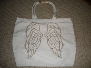 Victorias Secret white canvas with gold studded angel wings design 