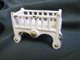 cast iron kilgore crib on wheels original paint