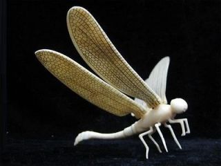   chinese handcraft ox bone dragonfly sculpture from china returns