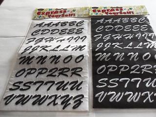 TWO SHEETS OF 48 EACH WHITE/BLACK EMBROIDERED IRON ON LETTERS ( BY 