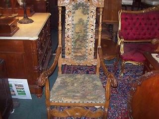 matched pair of hand carved throne chairs 