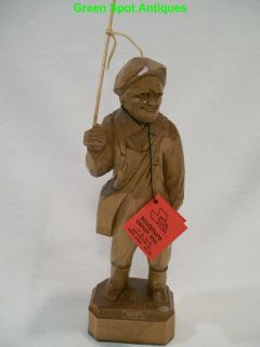 caron signed wood carving old man with fishing rod from