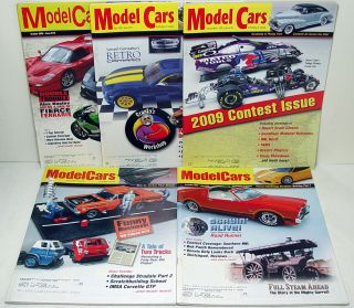 this auction includes a lot of 5 2008 2009 model cars magazines that 
