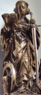  of a 15th century wooden sculpture of Saint Catherine of Alexandria 