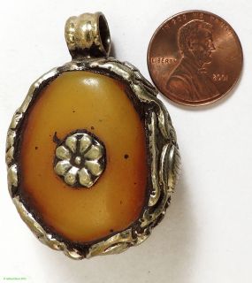 Tibetan Pendant Silver Repoussee Amber Colored