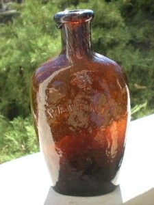 amber early pontil liquor bottle