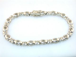 this auction is for vintage sterling silver cz link bracelet