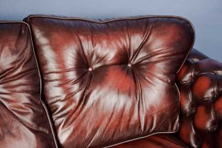 The buttoned back cushions give the sofa a more traditional flair.