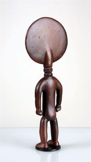  tall cast resin reproduction of an Asante African fertility figurine