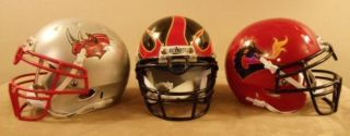 Three Former Arena Football League Team Mini Helmets