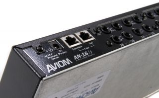 On the front panel, the Aviom AN 16/i has a four position gain switch 