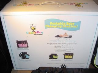   DIAPER BAG/PORTABLE BABY CHANGING STATION. NEVER USED IN OPEN BOX