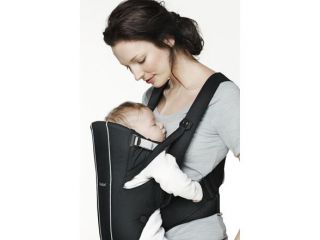Flap folded up with baby facing mom. (black/silver color is for 