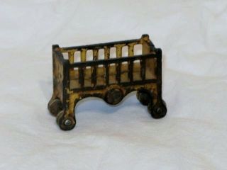 antique cast iron baby crib toy by royal time left