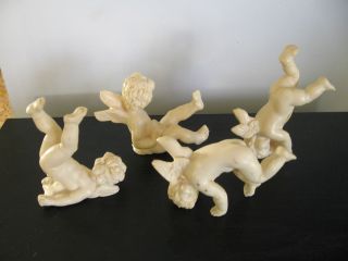 lot of 4 sculptor a santini italy cherubs angel figurine