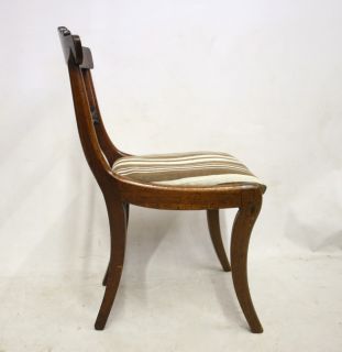   c1815 mahogany dining chair with curved cresting rials and carved and