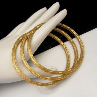   Trifari 3 Vintage Egyptian Engraved Bangle Bracelets Goldtone