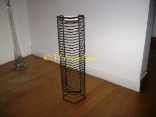   this cd wall tower rack holds total 35 standard single cd jewel cases