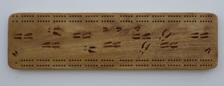 Cribbage board with carved deer tracks great for hunting camp