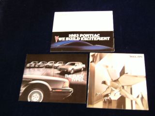    1980s Car Sales Brochure Dealer Lot of 11 Cadillac Buick Pontiac