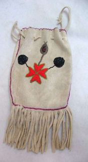 this a hand crafted buckskin deerskin pouch bag which measures 