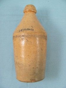 antique stoneware bottle signed jg carner