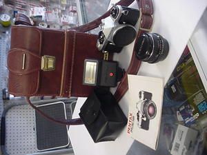 Pentax ME Super Film camera with AF200S flash, 50 mm lens and carry 