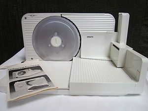    UNIVERSAL COMPACT SLICER MODEL 355 70 51 IN WHITE WITH ORIGINAL BOX