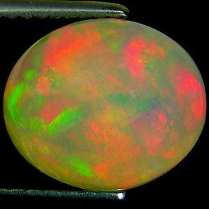 51 ct Natural Ethiopian Welo Multi Color Play Rainbow Opal Oval 