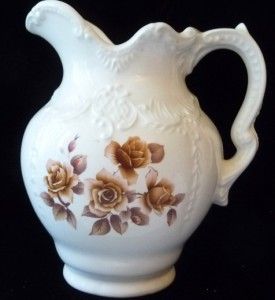 white ceramic pitcher brown roses jill aynels