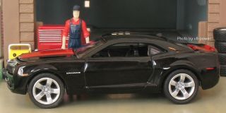 2010 Chevy Camaro SS in Black with Victory Red LeMans Stripes