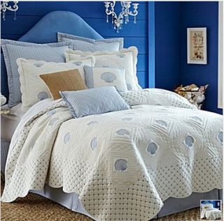 the blue and white beachy feel of the seashell bedding collection