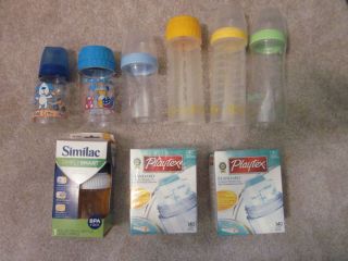 Playtex drop ins bottles with bags, and 1 similac bottle, 1 regular