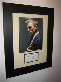 You are bidding on a rare authentically signed 16x12 display shown
