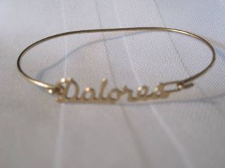 Gold Tone Metal Dolores Wire Name Bracelet Bangle Cuff